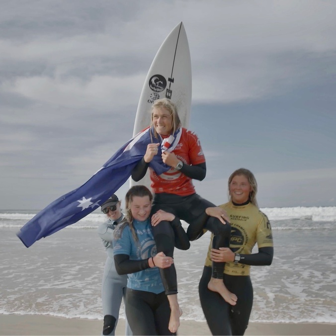 elite athlete surfer being chairlifted