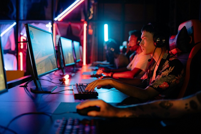 people playing games on computers