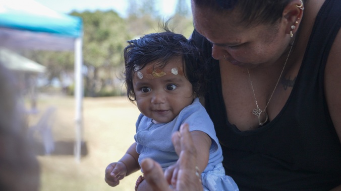 Baby with carer