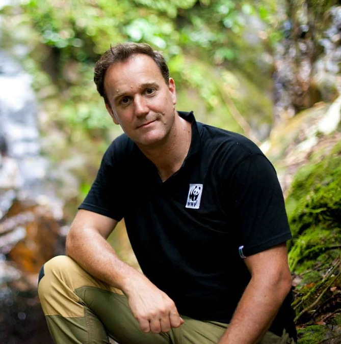 Dermot O'Gorman sitting in a jungle