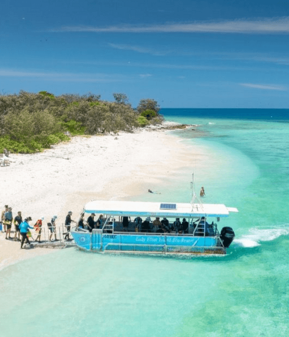 people walking off glass bottom boat at Lady Elliott Island