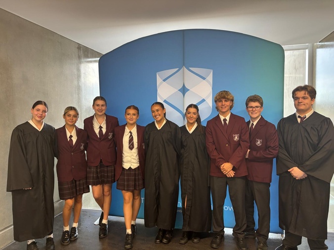 Row of high school students smiling