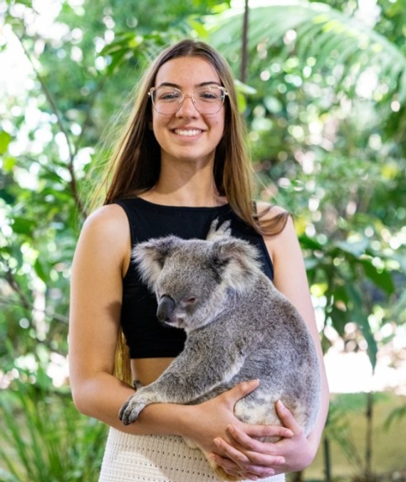 Global Student holding Koala