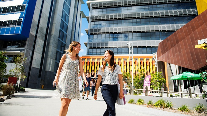 Early Offer at Southern Cross University - image show two students at Gold Coast campus