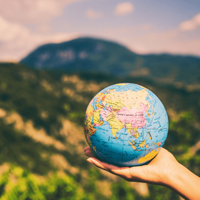 Globe in hand