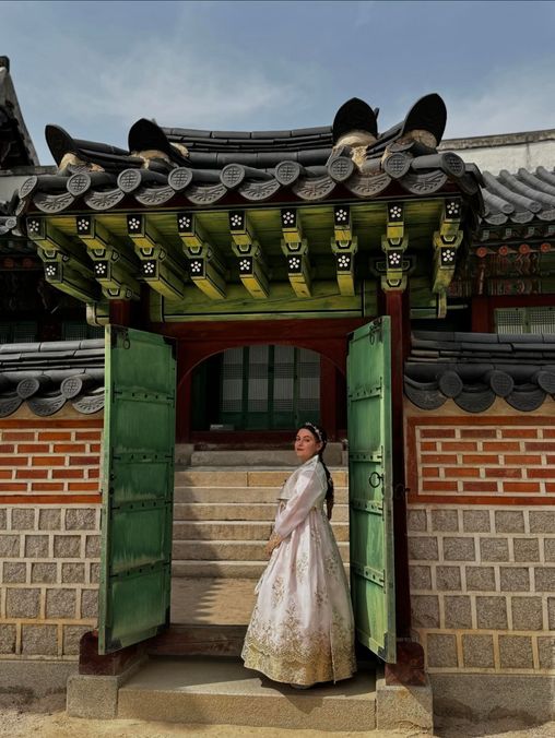 Yasmeen in front of temple