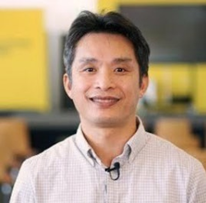 A man smiling at the camera