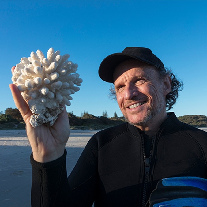 Man holding coral