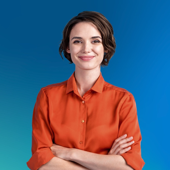 Woman dressed in a red blouse with her arms crossed