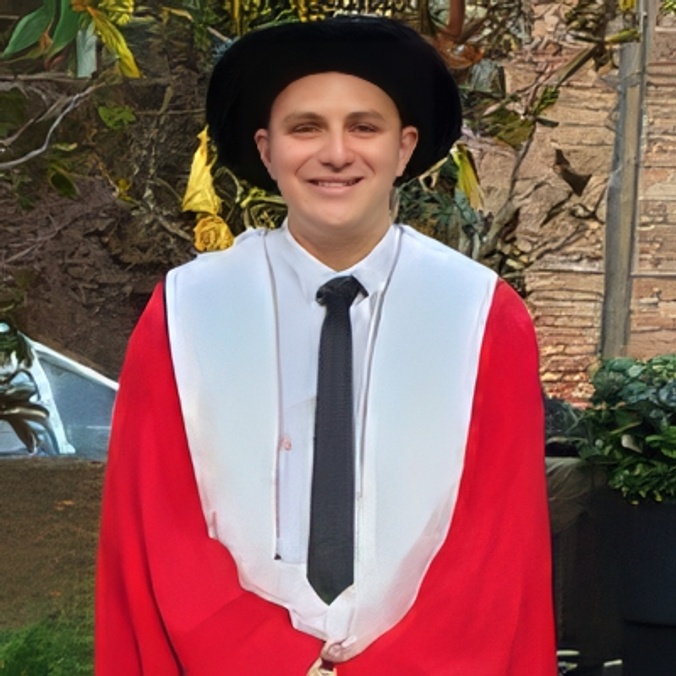Portrait man in graduation attire