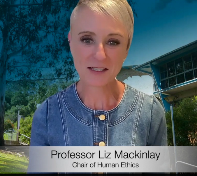 Person with short hair smiling while talking in video