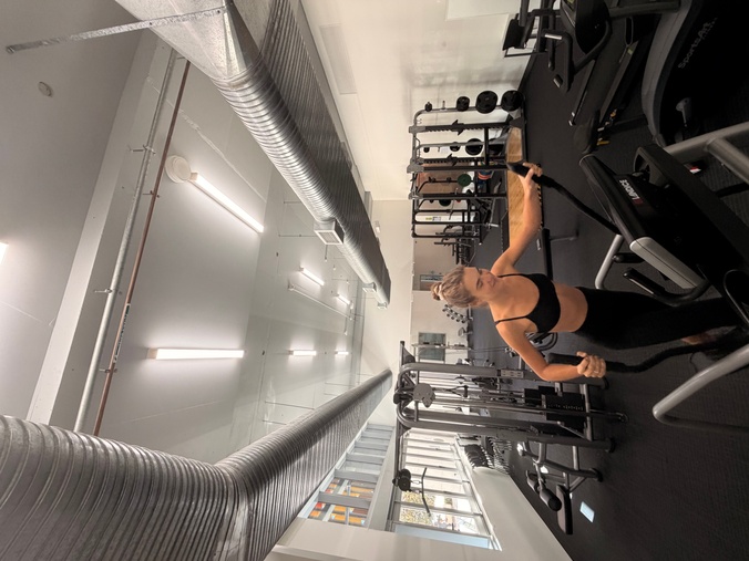 Female working out at Gold Coast University Campus Gym