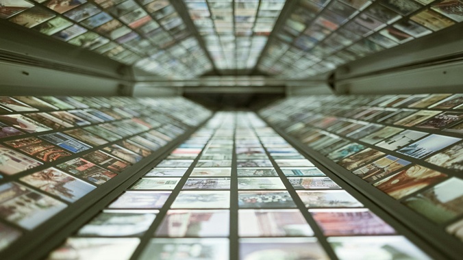 tunnel view of many screens - image source nico-knaack-bsTeLOnmNWQ-unsplash