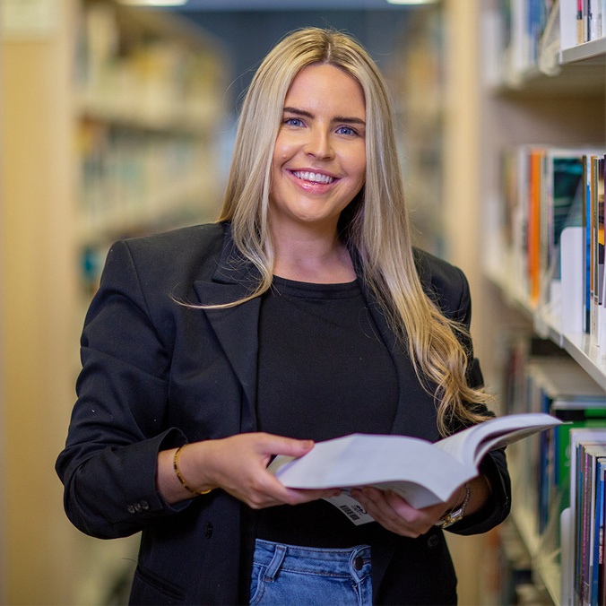 Jordan Hansen - Law student in the library