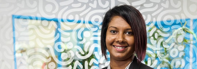 female student with patterned background