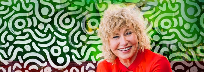 Sharon Styman sitting with an edited Live Talks background