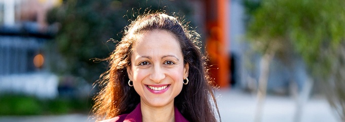 A woman smiling at the camera