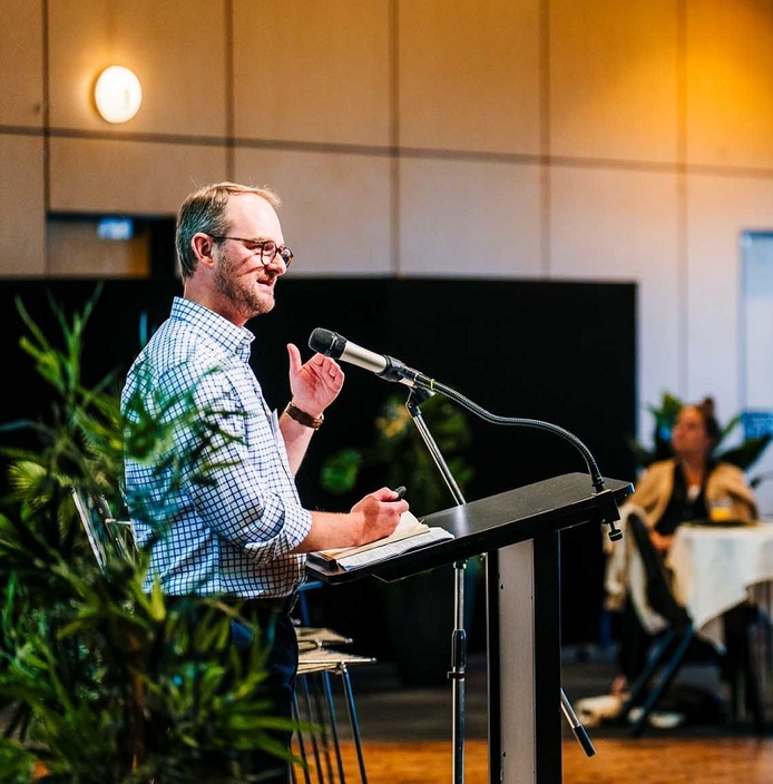 A man at a lectern
