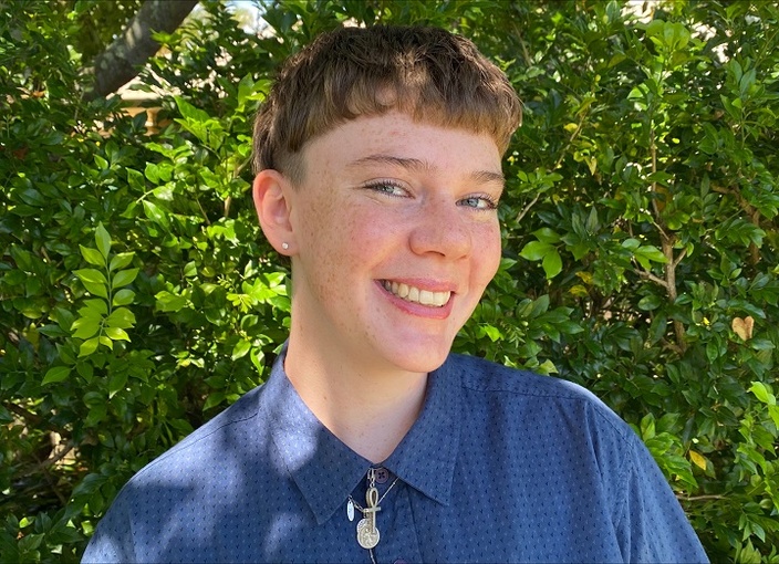 A person smiling at the camera