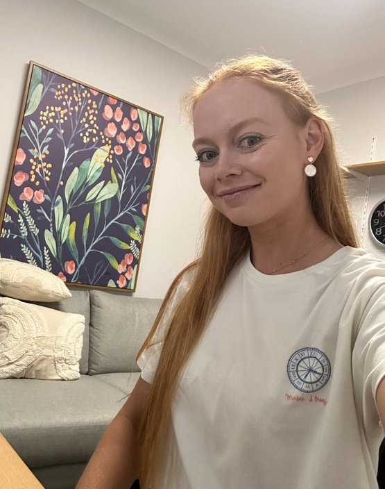 Woman in white shirt in office