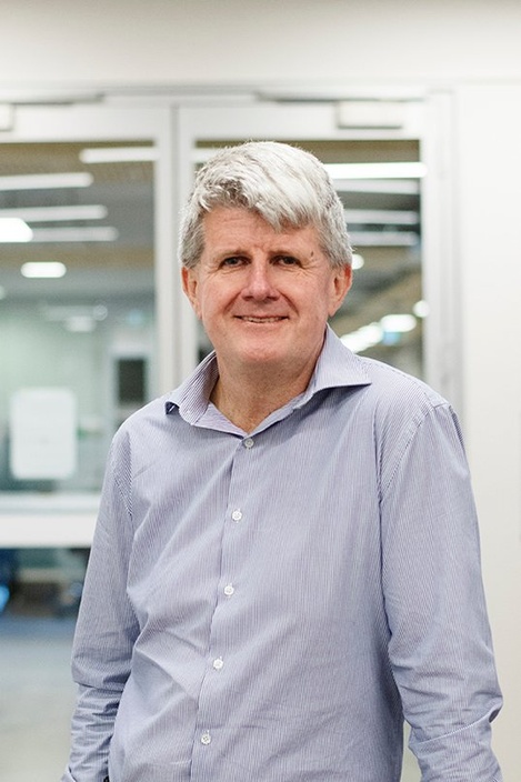 Man with light blue shirt