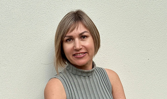Headshot of woman with blonde short hair