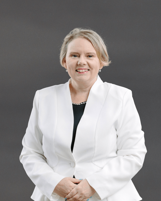 woman in white suit