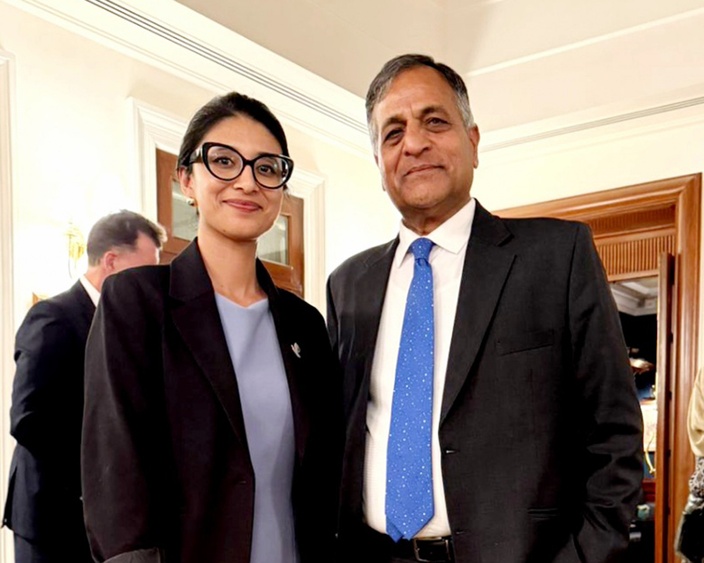 Ashok Lavasa and SCU staff member Subhi Pradhan in New Delhi, India