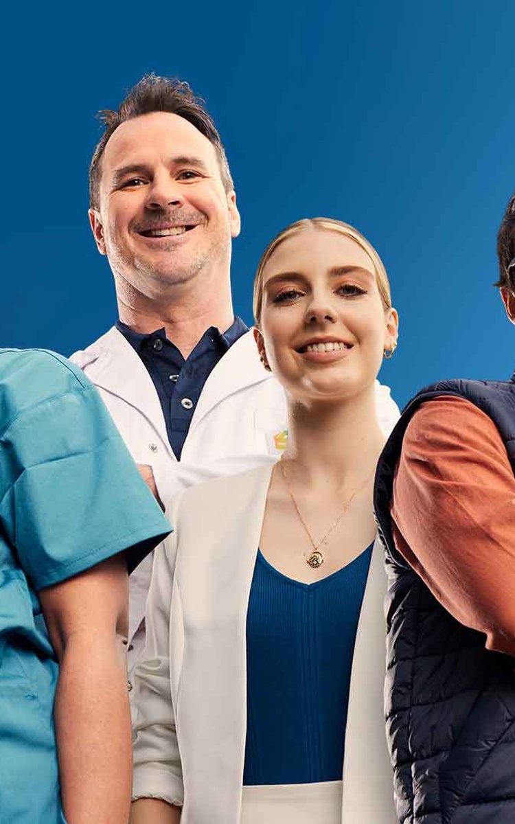 A nurse, a scientist, a business student and a teacher as a group shot