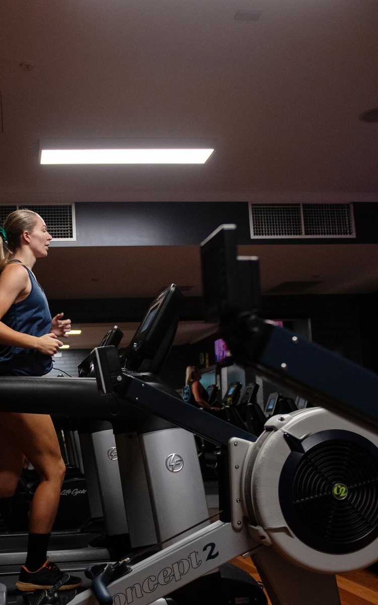 Exercise science student Kiara Richardson running on a treadmill at the Lismore gym. She is completing her placement hours through NCAS, North Coast Academy of Sport and Southern Cross University Health Clinic.