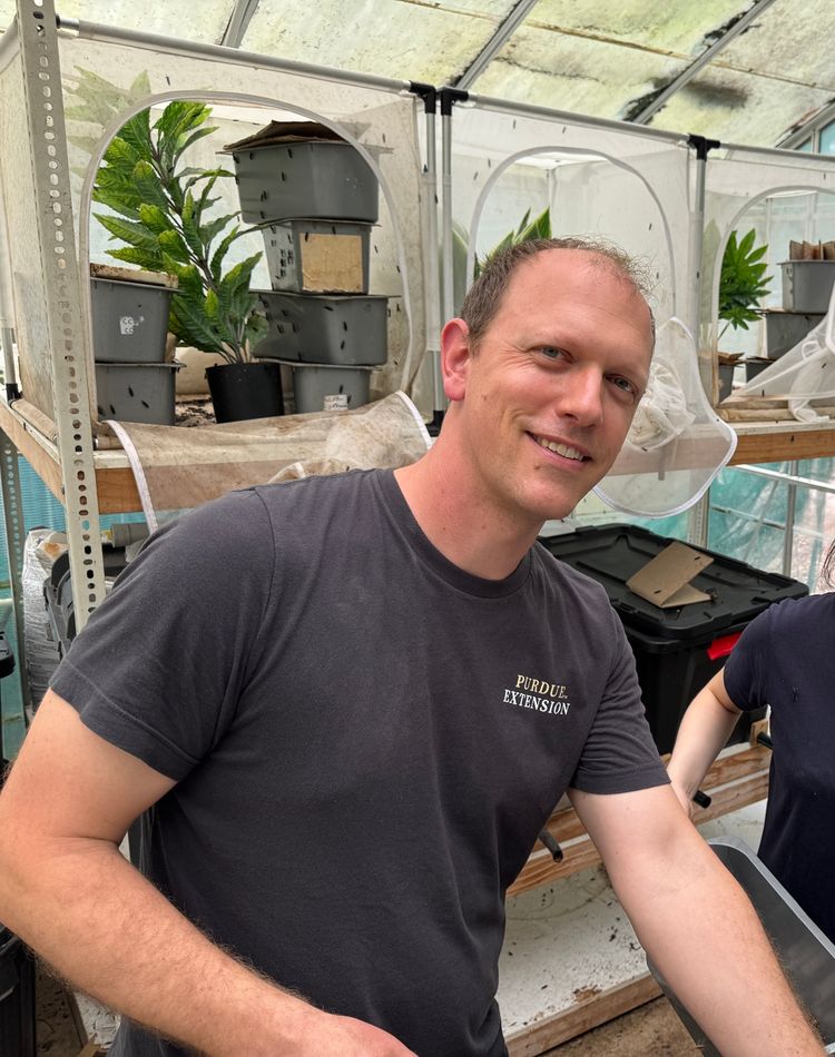 A man and a woman in an open laboratory setting