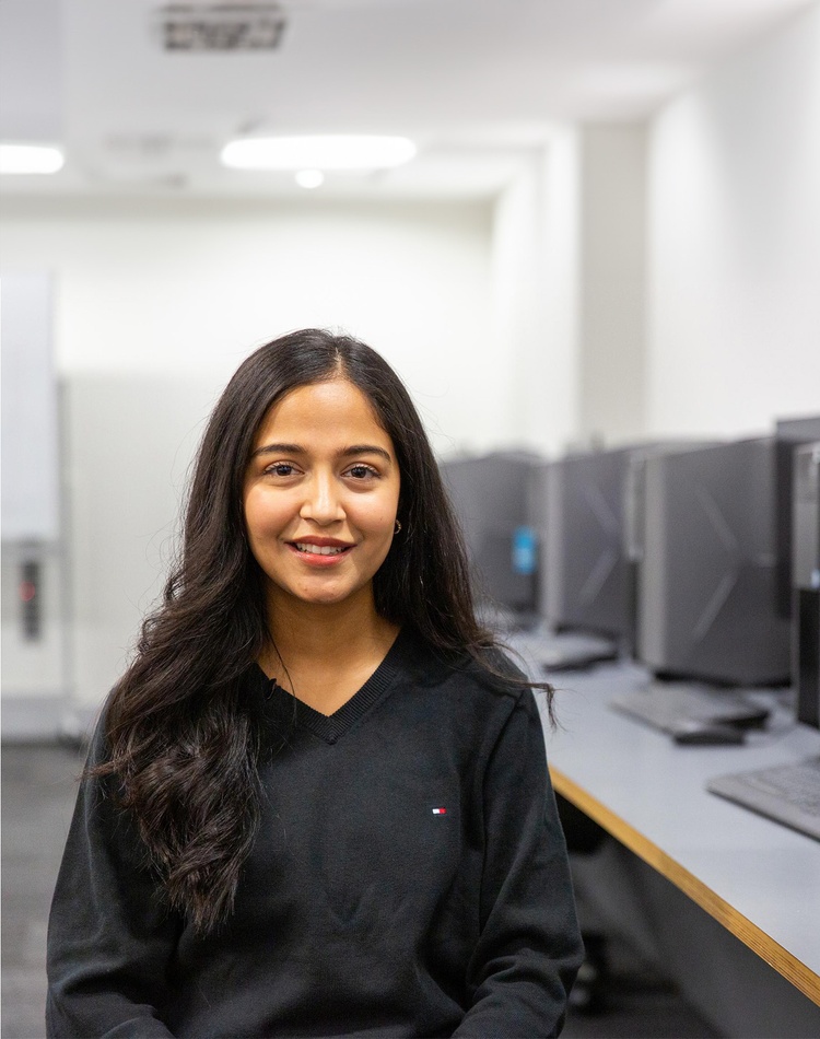 Mrisha Upadhyay in the SCU computer lab, master of computing