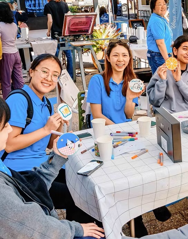Students painting at a LEXSA workshop outdoors