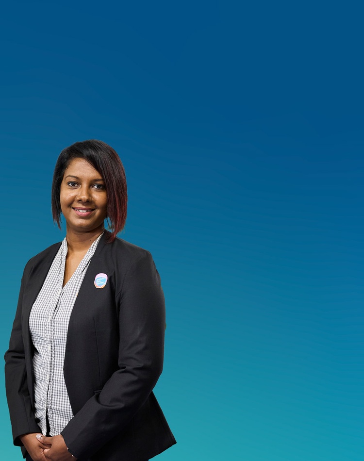 Education graduate Dulari Gonwala on blue gradient background