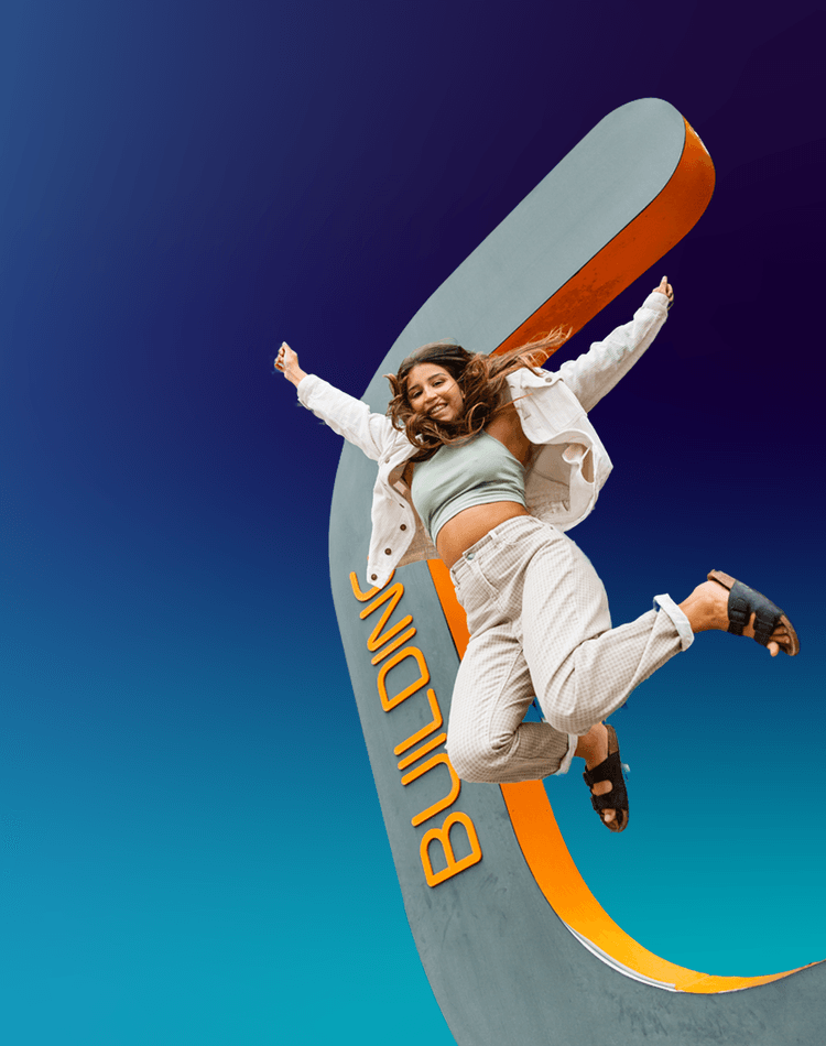 blue background with female student on right side jumping in the air