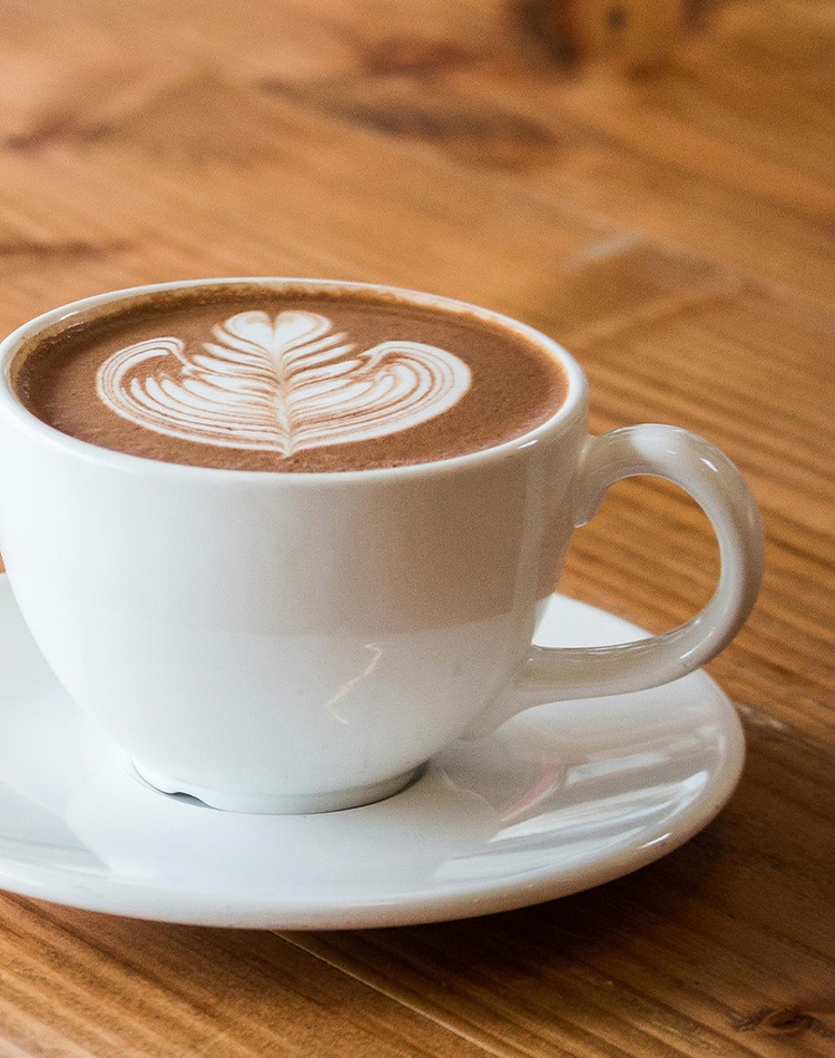 A cup of coffee on a table