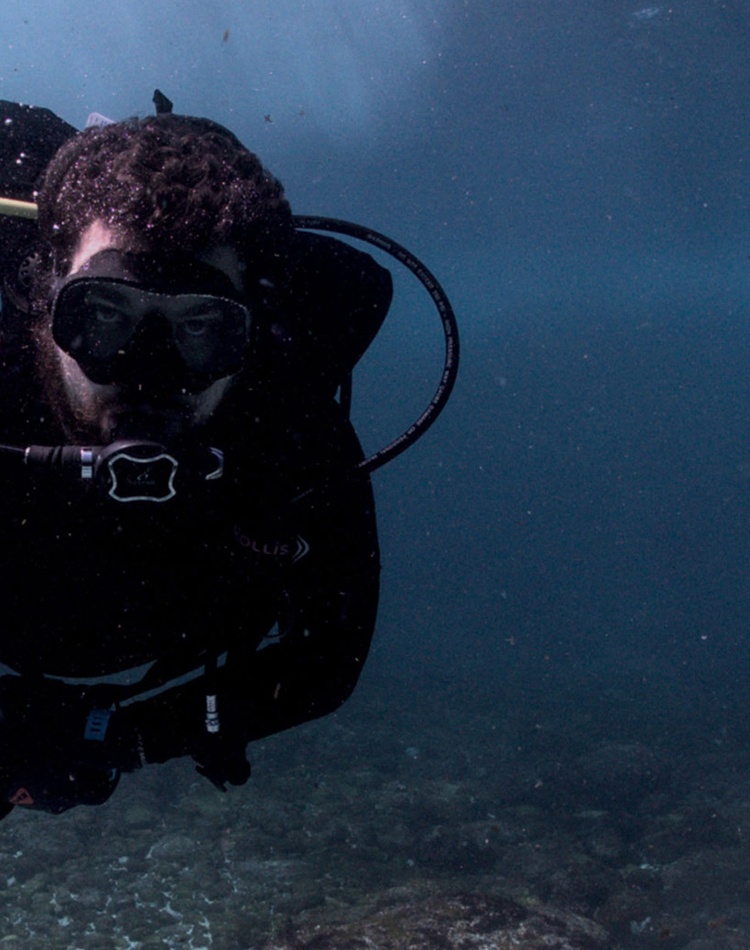 Jordan ivy in scuba gear underwater on the great barrier reef