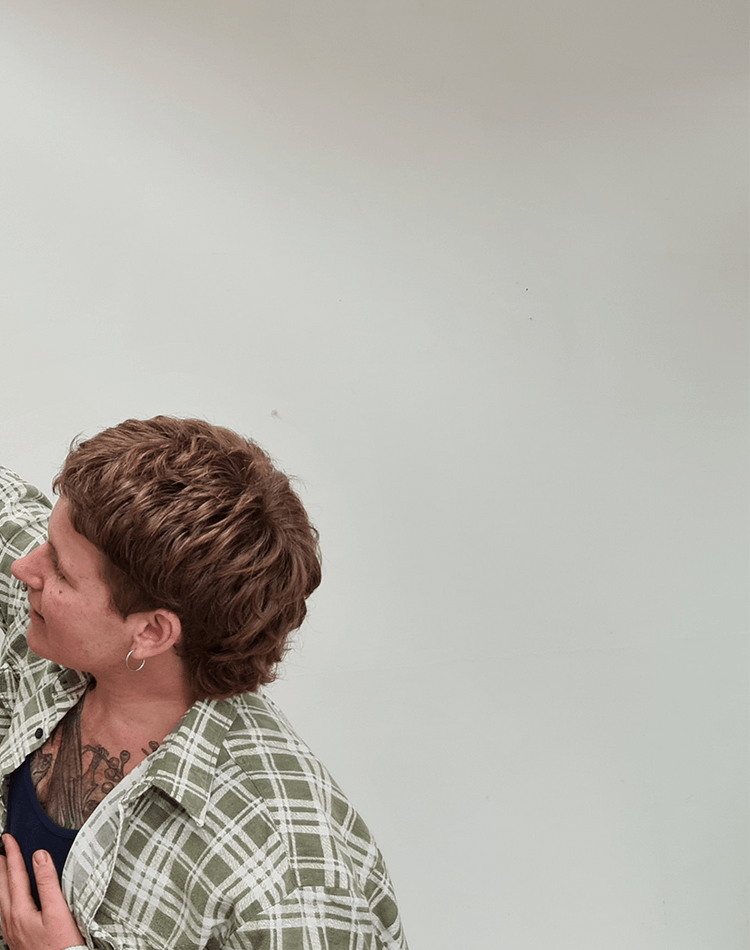 Student painting portrait of woman