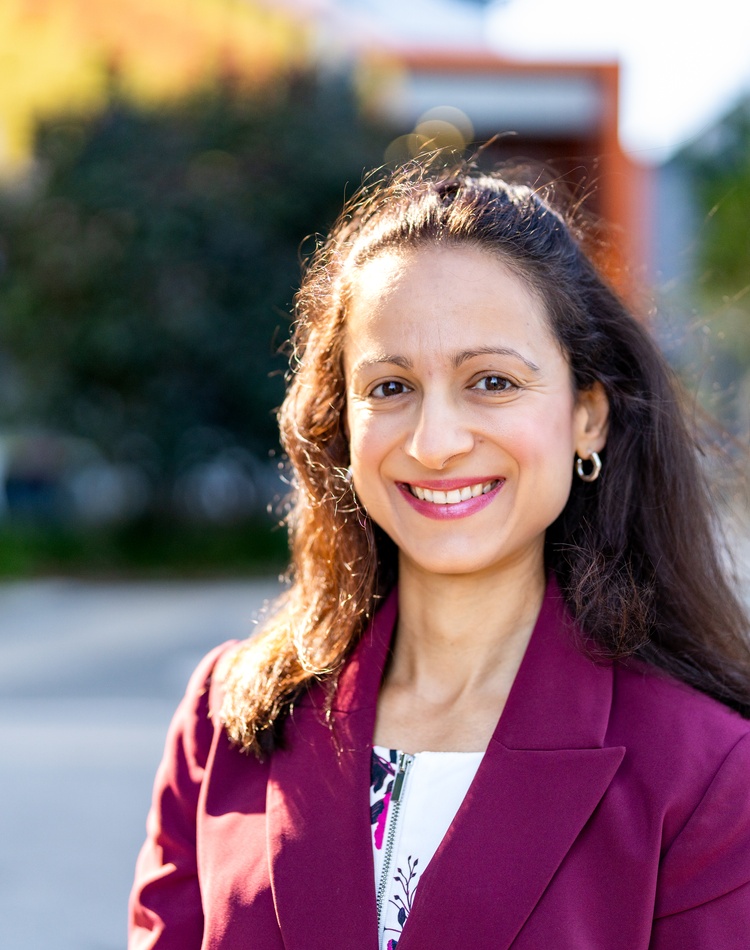A staff member outside GC Campus
