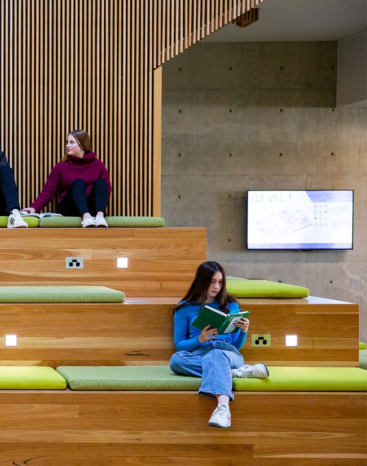 Group of students sitting in the Lismore library