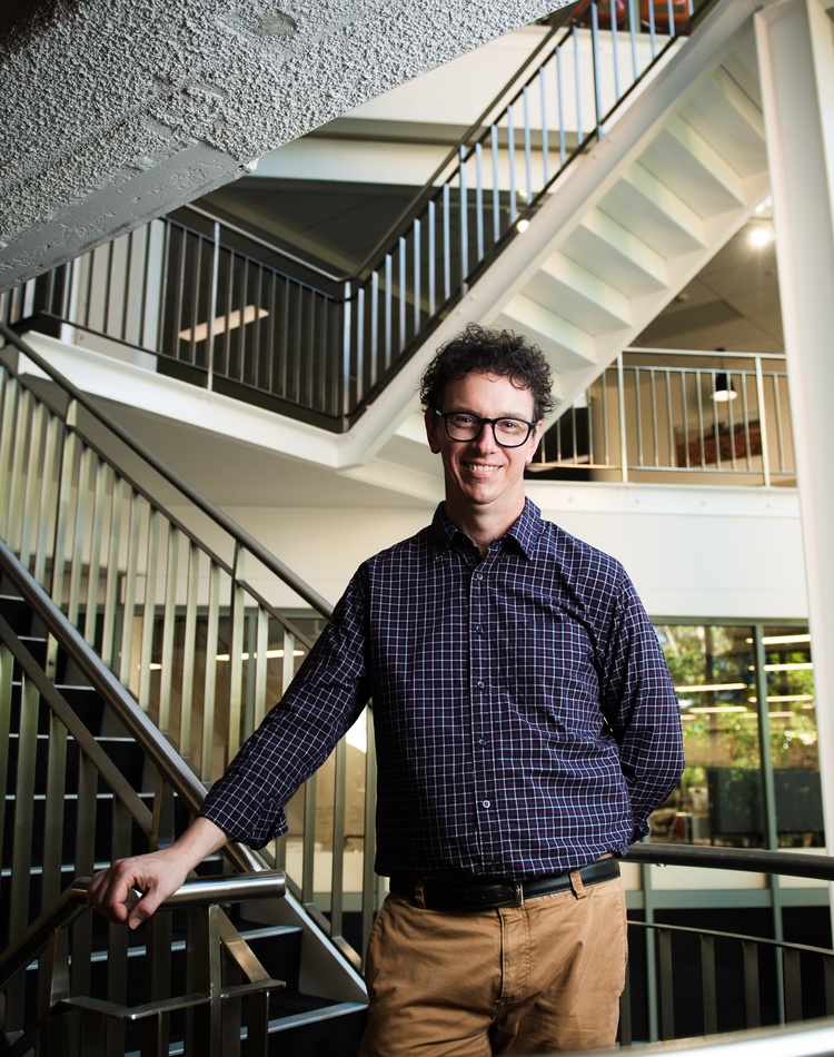 Academic standing on stairs