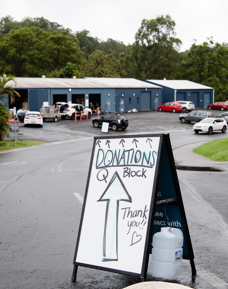 A poster board asking for donations