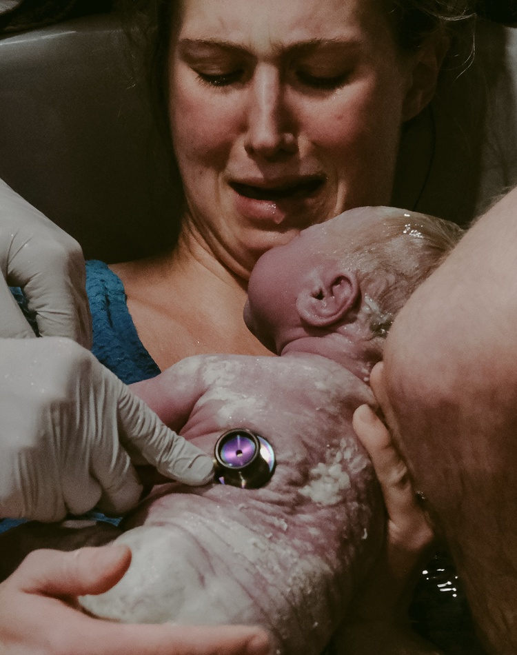 Newborn baby with mother