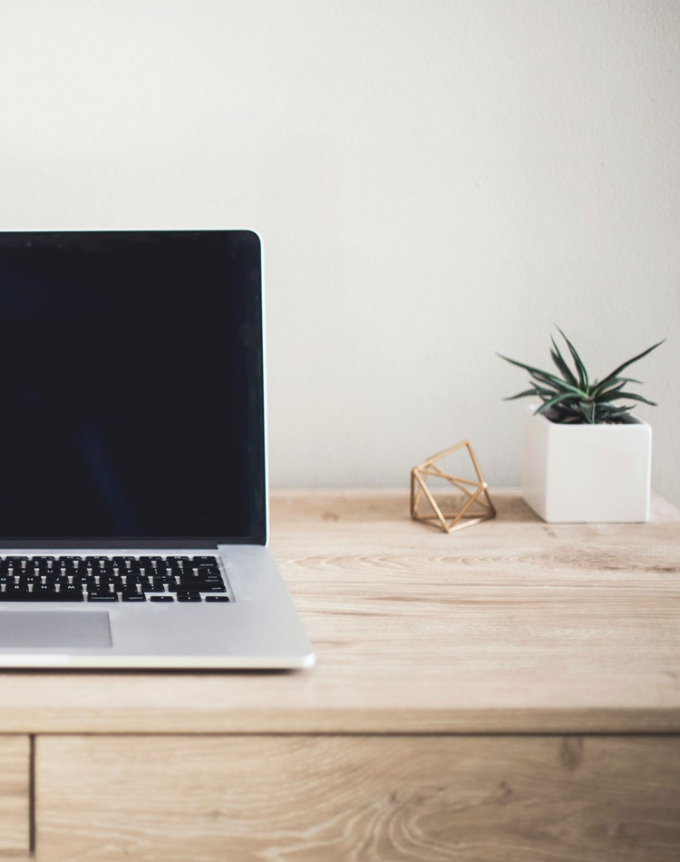 laptop open front on with blank black screen