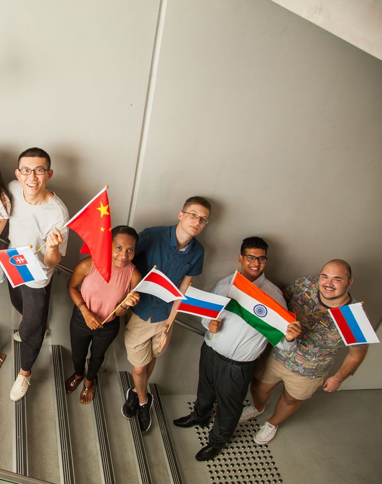 students standing in stairwell