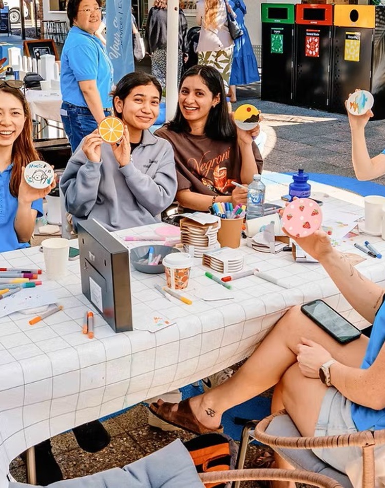 Students painting at a LEXSA workshop outdoors