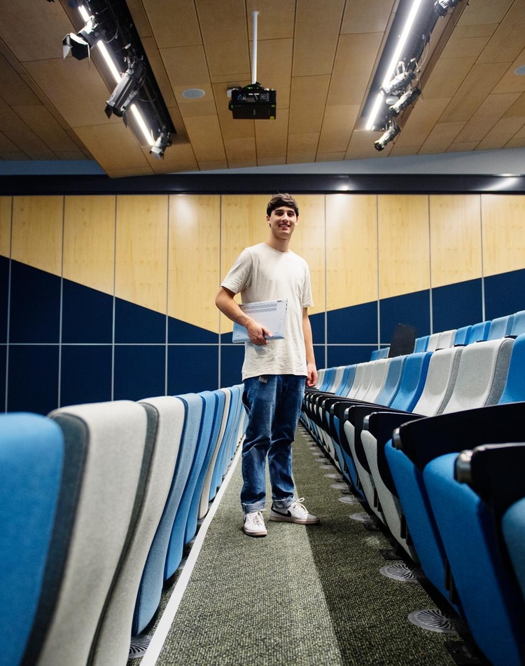 Davi Algranti standing in a lecture theatre