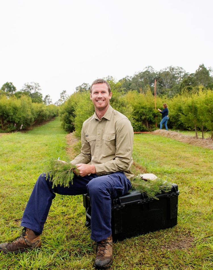 Agriculture student in field.
