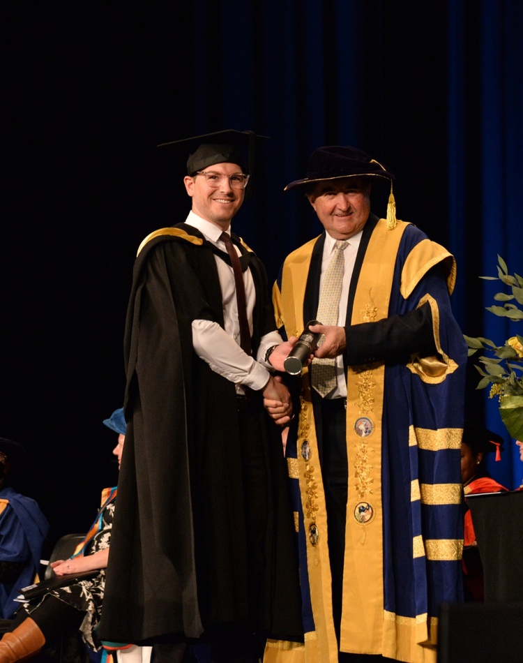Andrew Nichol receives his Master of Business Administration