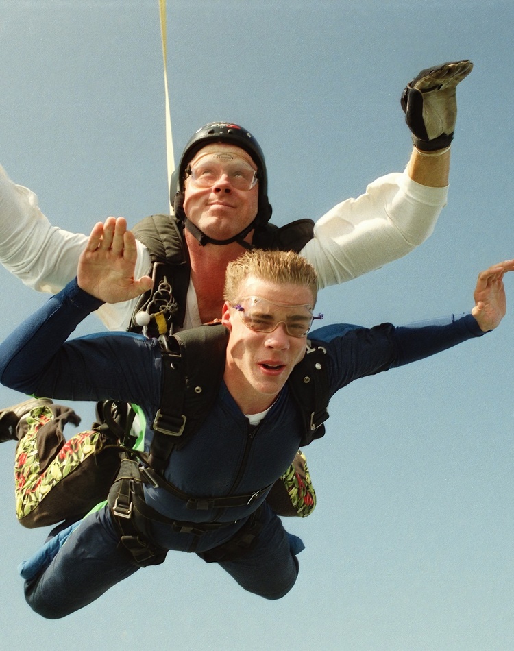 Two sky divers in mid flight
